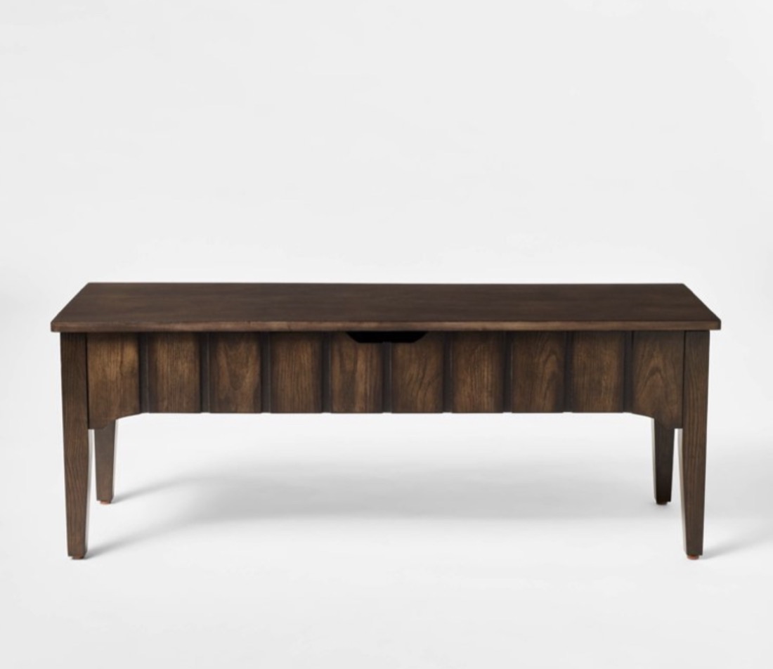 Walnut-finish solid wood coffee table with slatted apron