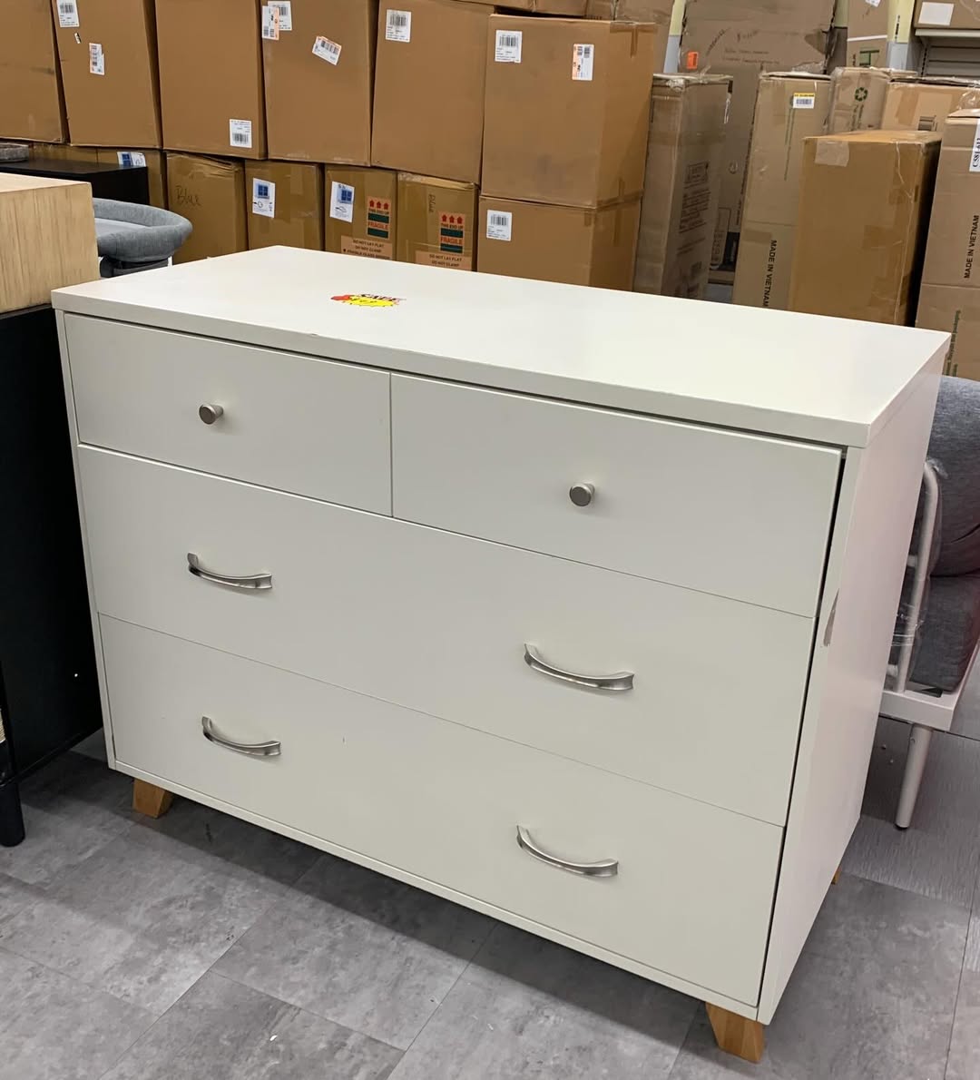 White four-drawer dresser