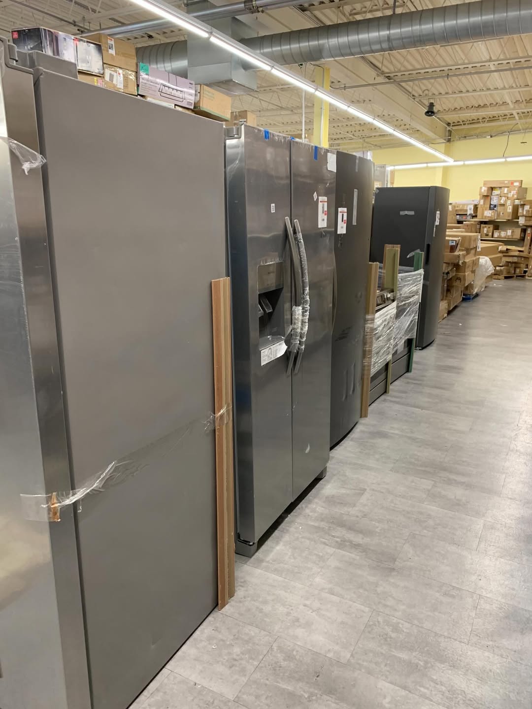 Row of stainless steel refrigerators