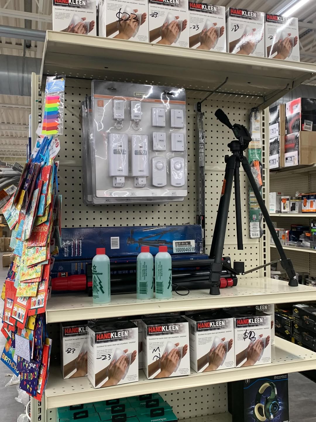 Tools and tripod with hardware shelving